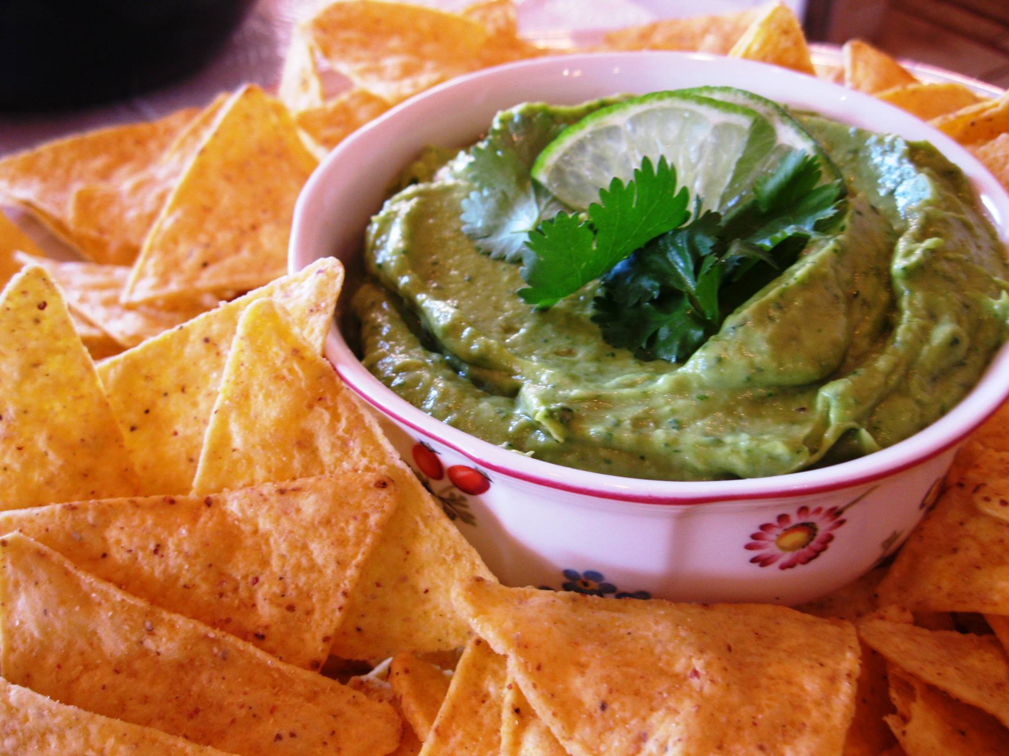 Coriander, spring onion and lime guacamole with corn tortilla chips
