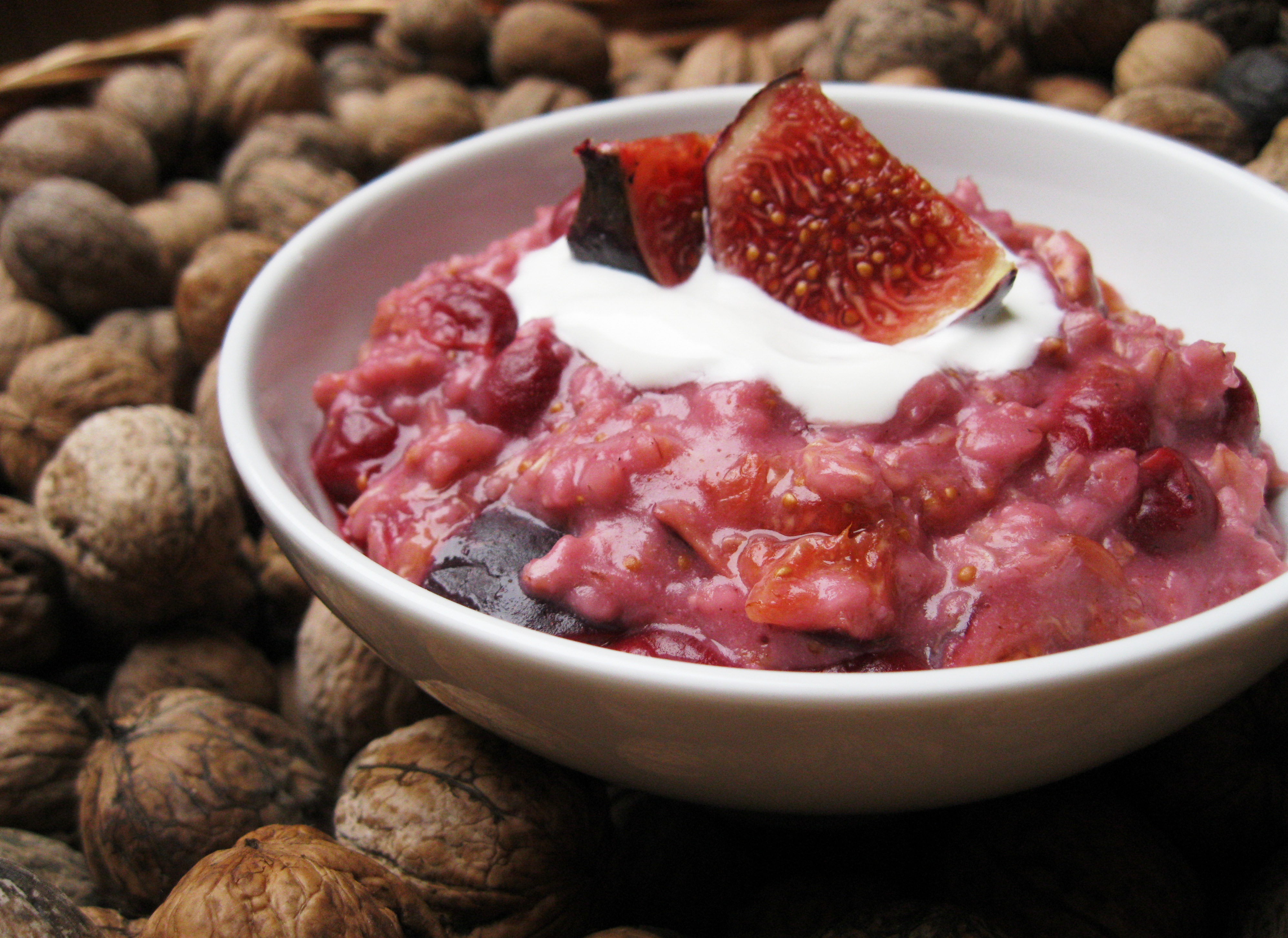 breakfast porridge with figs and cherry and walnuts
